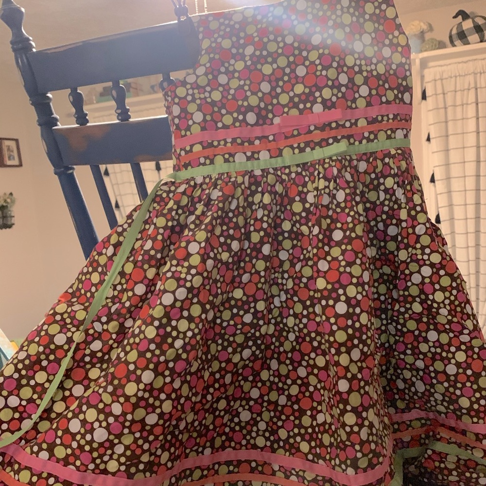 Brown , poka dotted dresses ( dots pink, green)